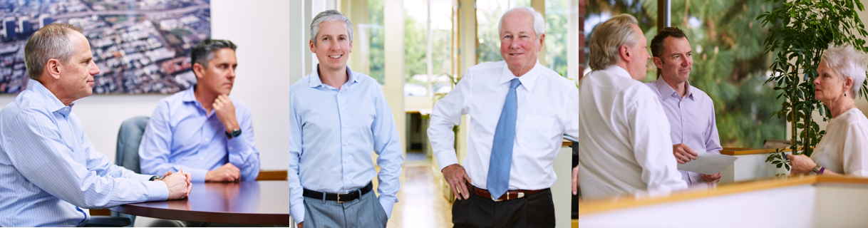 WESTMAC Commercial Brokerage Company team members collaboarting in the office
